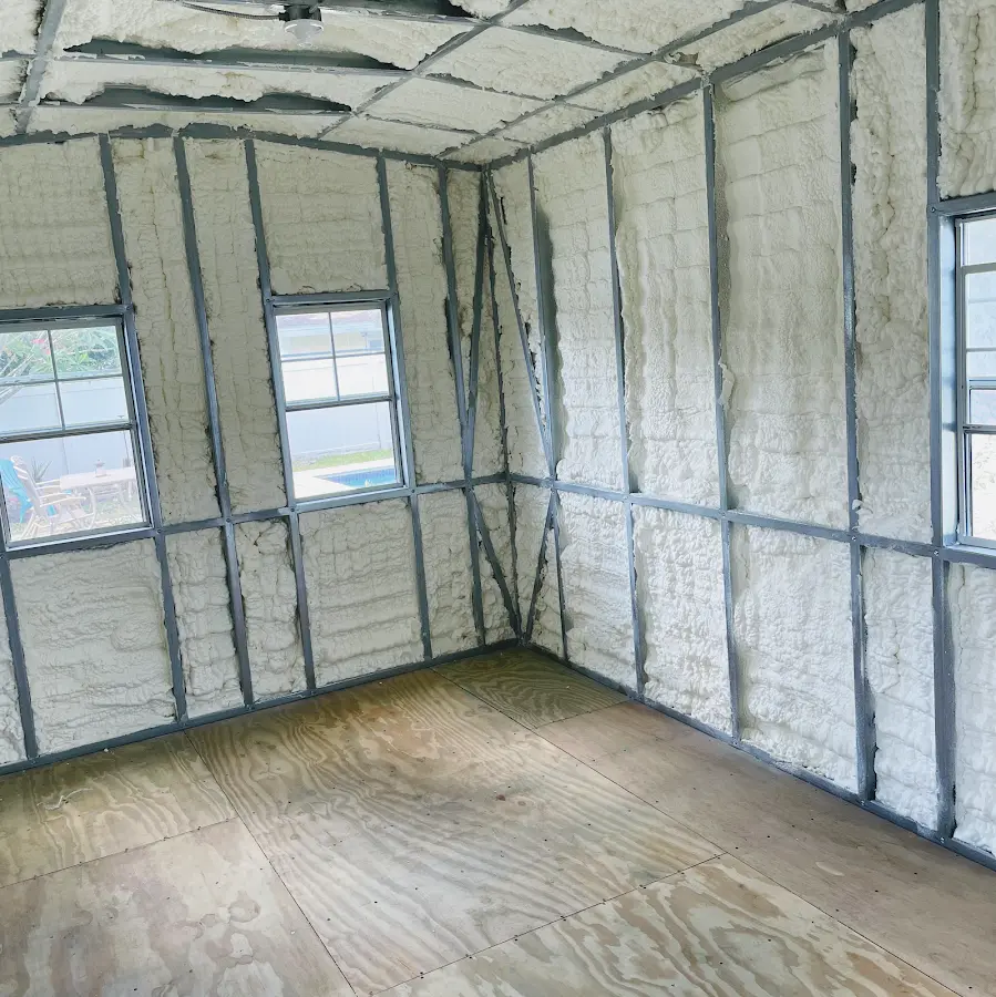 Closed-cell spray foam insulation applied to wall cavities in a residential project in Bridgeport