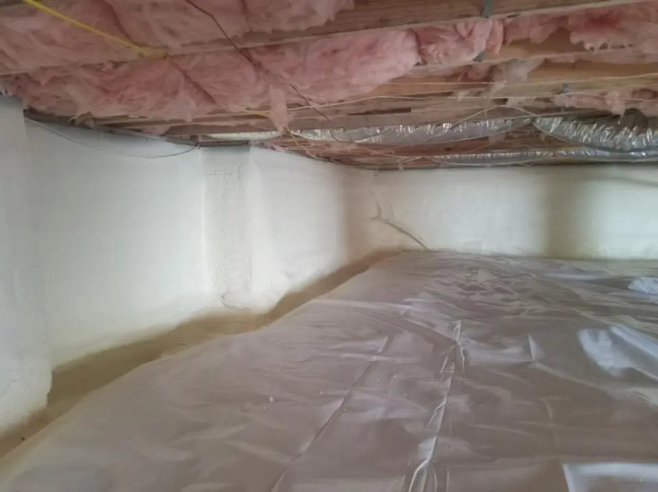 Crawl space encapsulation with closed-cell spray foam for Commercial Roof Restoration in Bridgeport